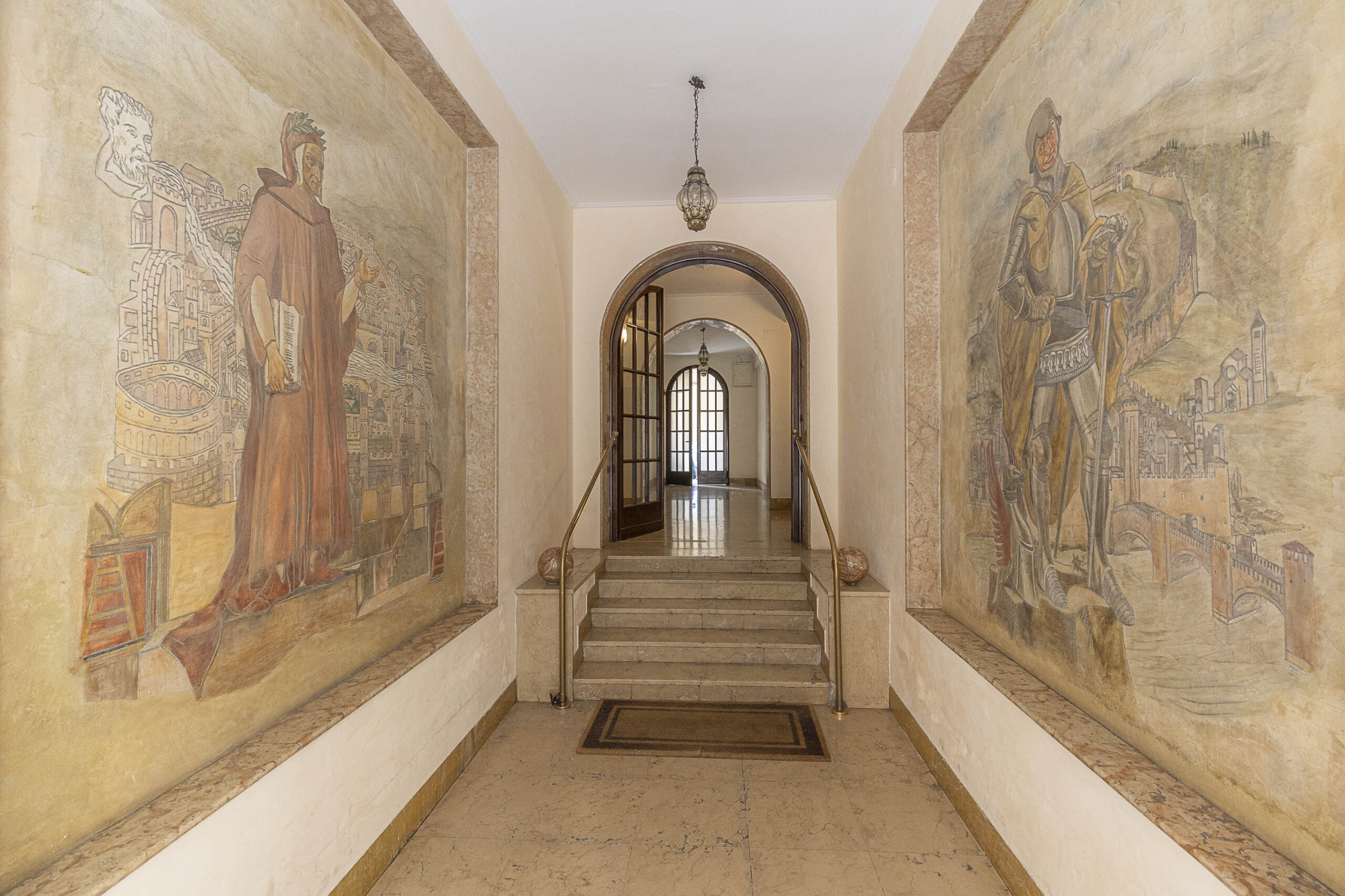 Entrance corridor with historical frescoes in the building of Castelvecchio Apartment in Verona
